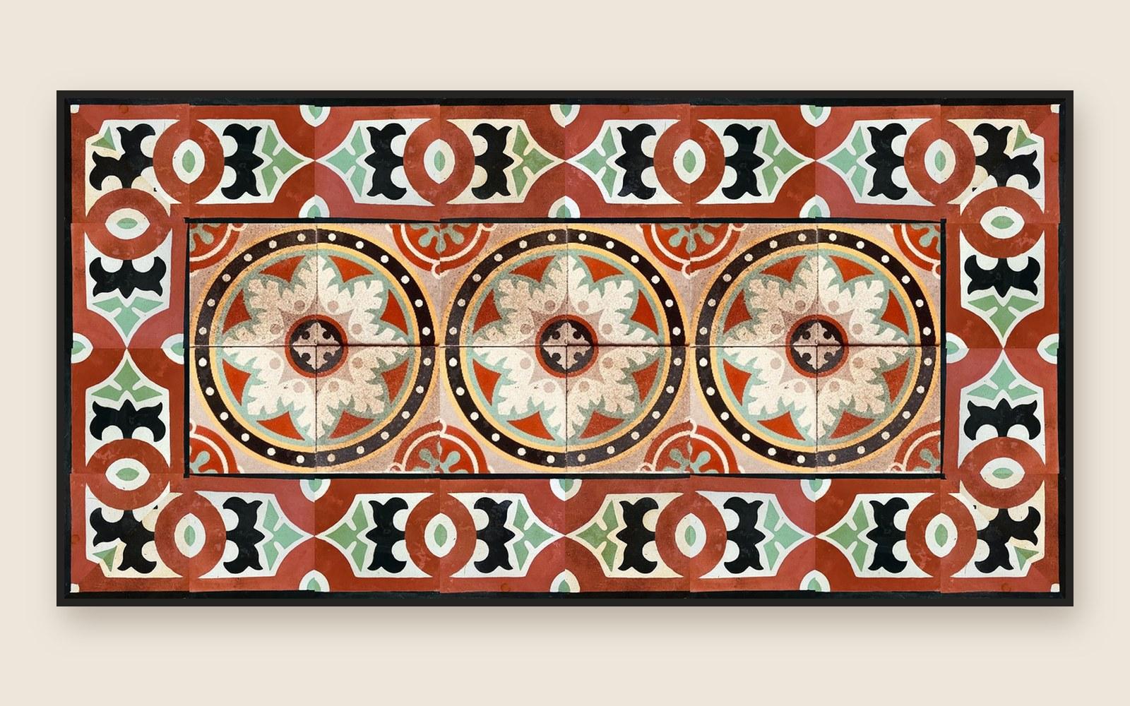 Mesa de 160 × 80 cm con tapa de hidráulico recuperado: medallones en el centro y cenefa roja y verde